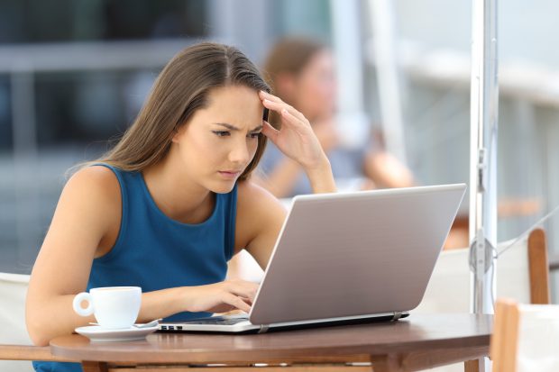 Photo of woman using laptop.
